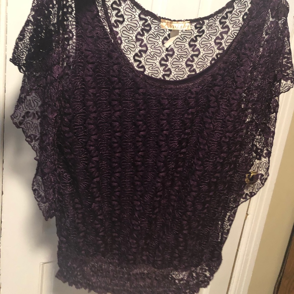 crochet shirt with a sewn in cami underneath.